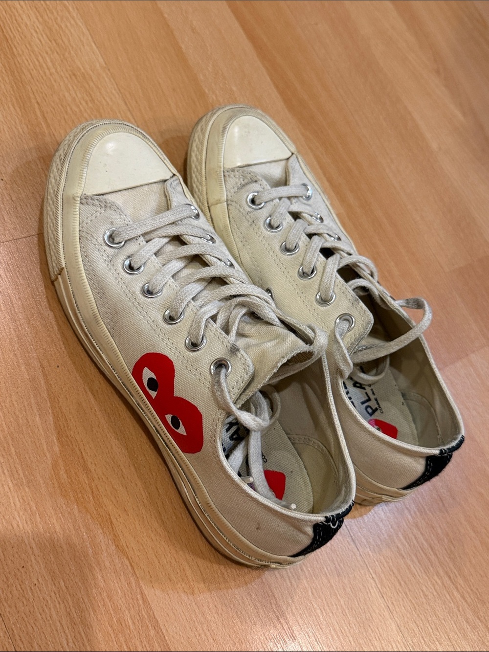 Comme des Garçons PLAY Canvas Low-Top Sneakers in Off-White with Red Heart